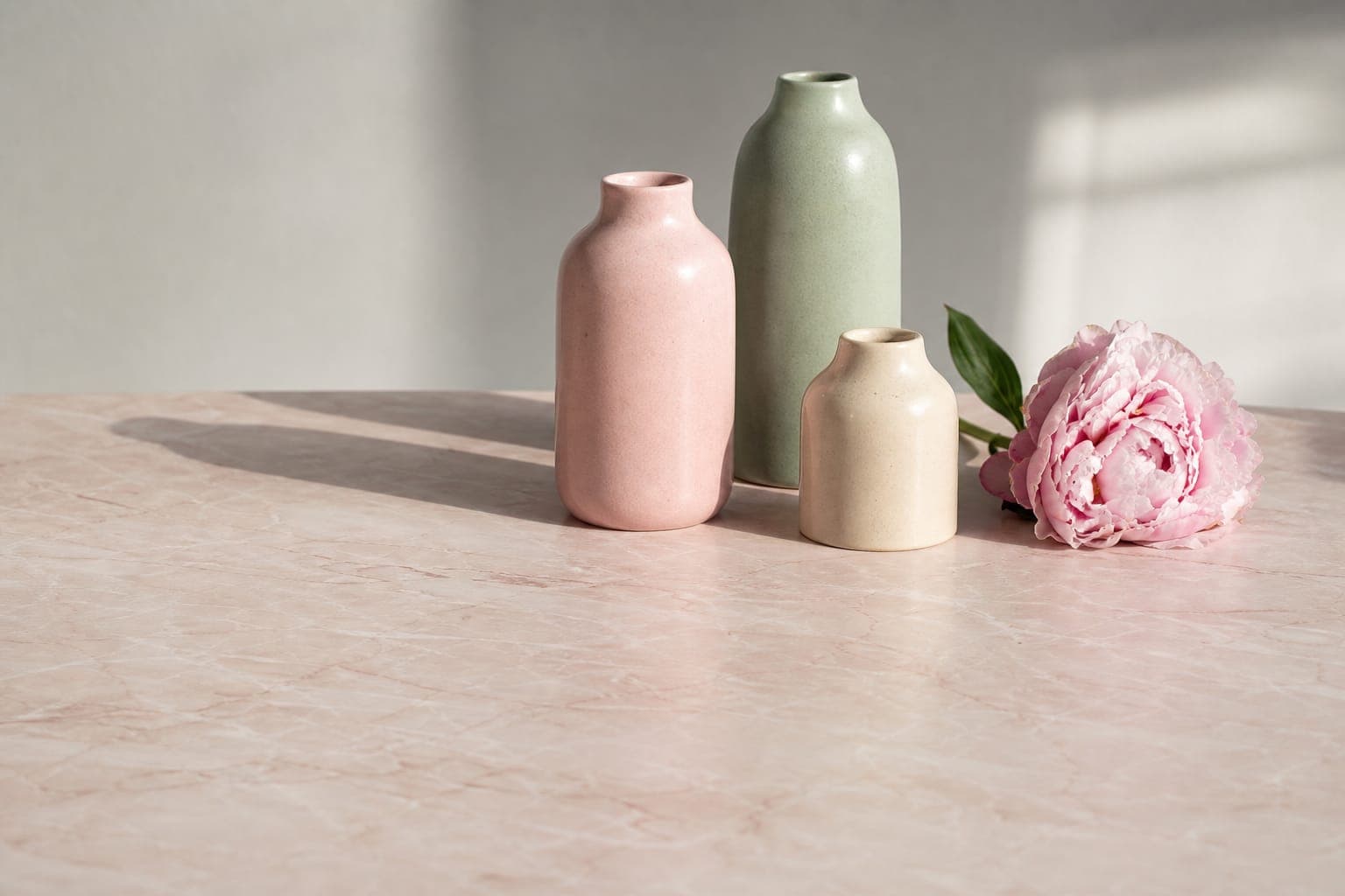 Editorial beauty flat-lay on textured paper, restrained pastel palette